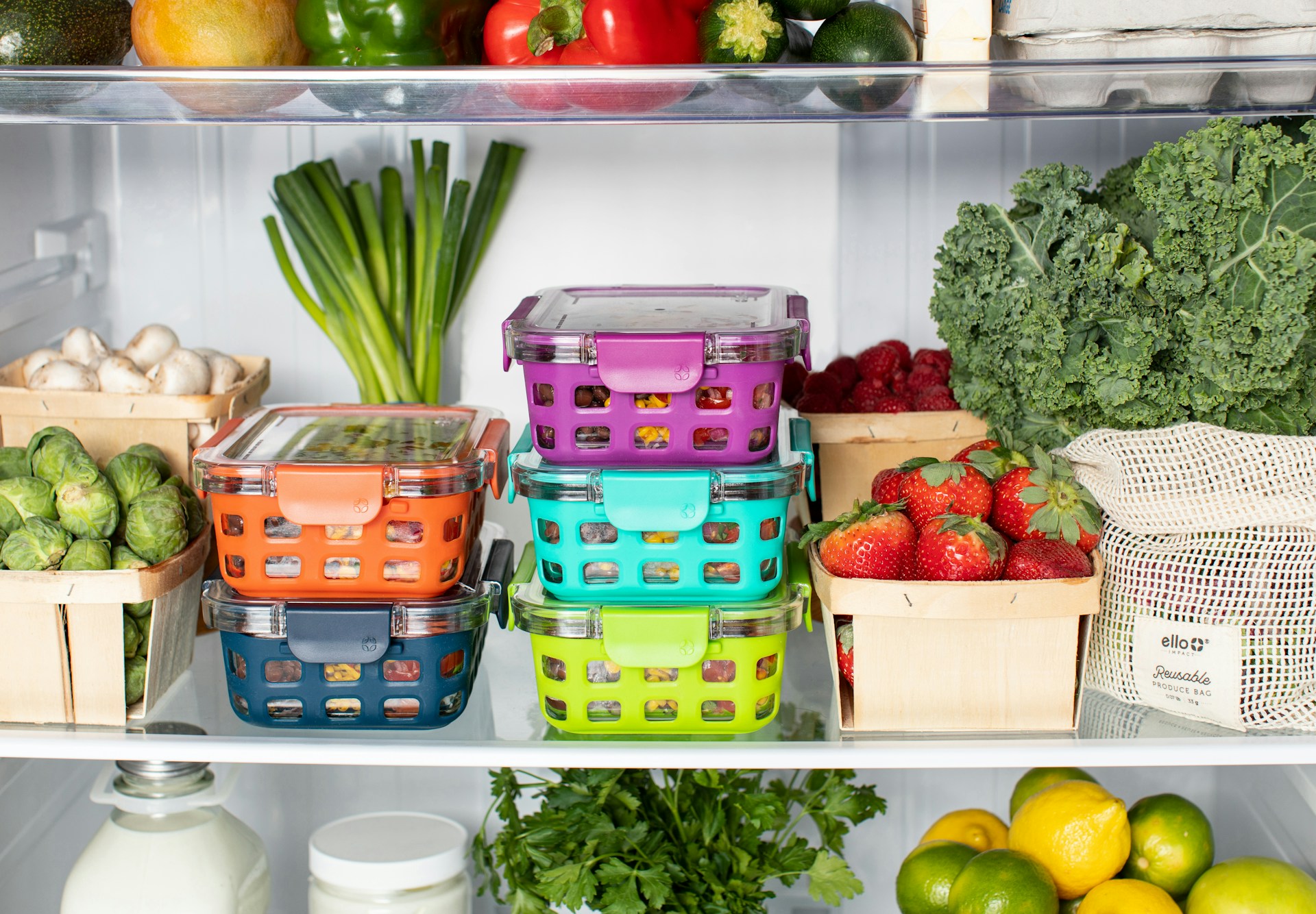 Well-organized refrigerator with clear containers and proper food placement